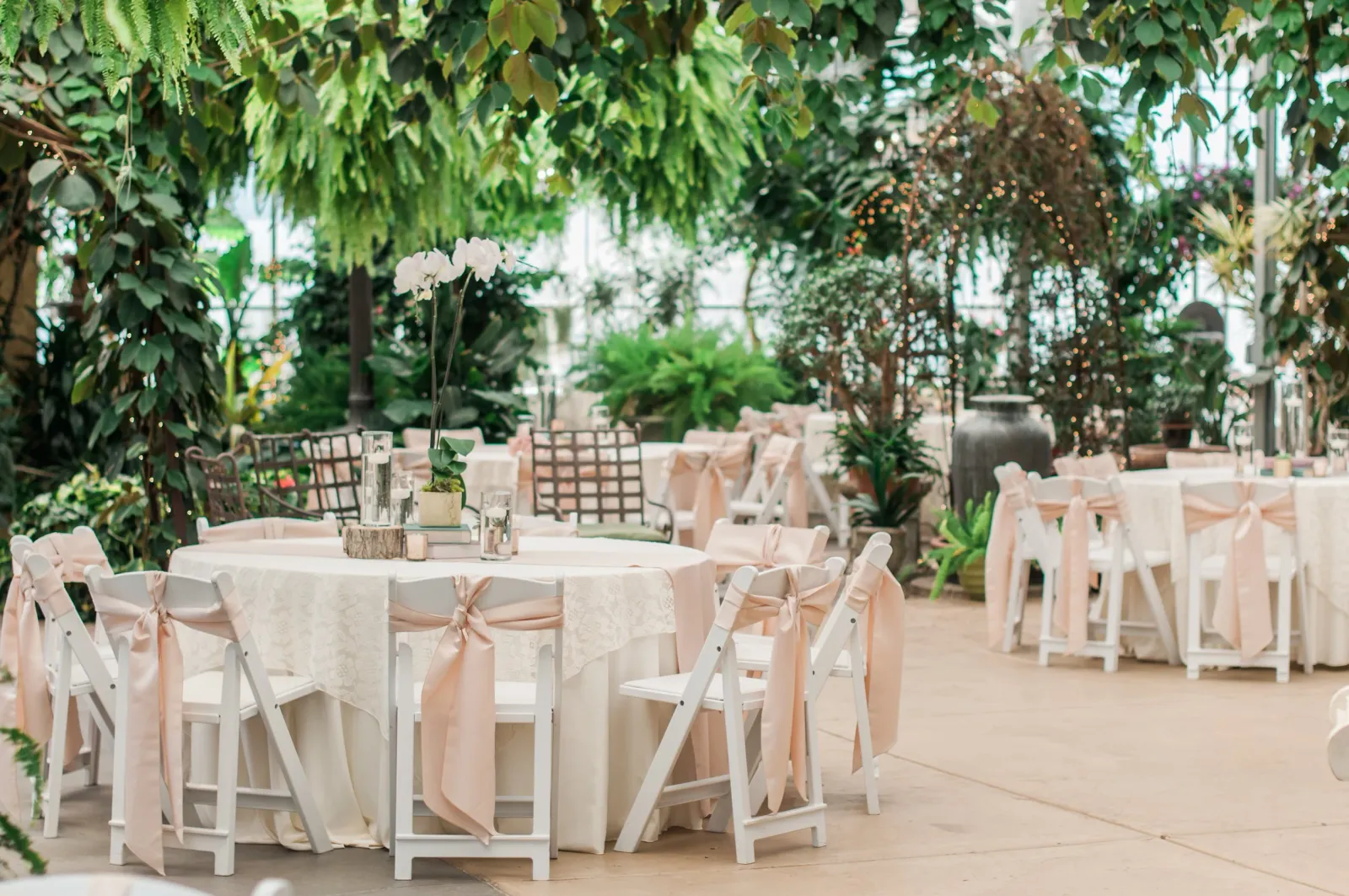 Le Jardin indoor garden venue with lush greenery